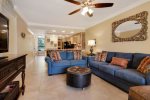 Livingroom with comfy furnishings and flatscreen TV